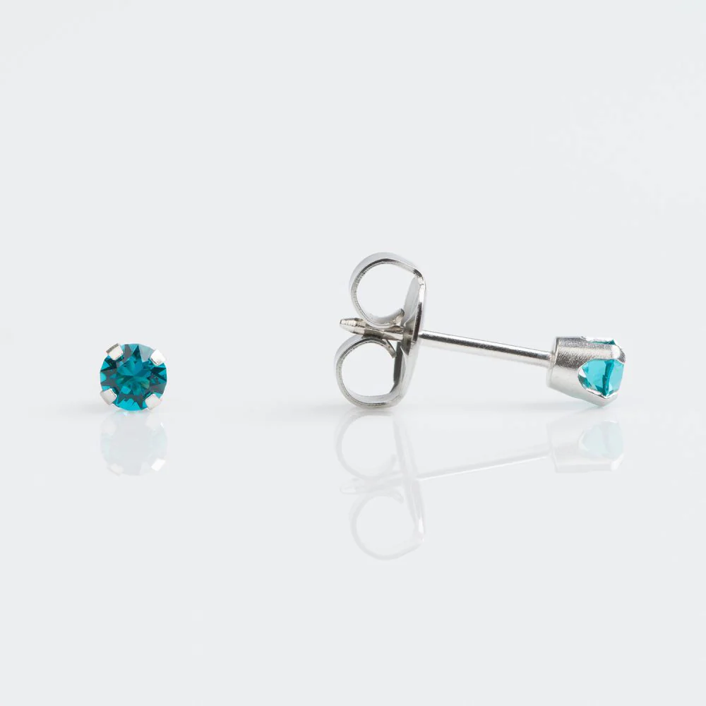 9CT WHITE GOLD TIFF. 3MM DECEMBER BLUE ZIRCON